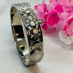 EUC Silver Coach Signature Kissing C’s Bangle